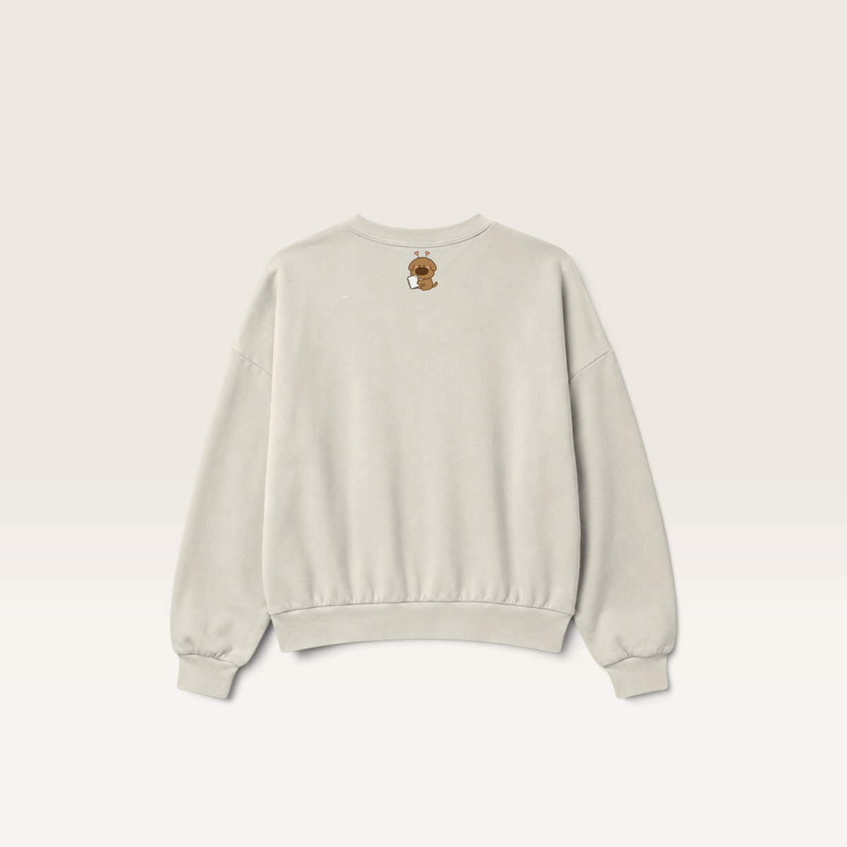 iTsChoCoBu Autumn Basket beige crewneck sweatshirt featuring a small puppy graphic on the back
