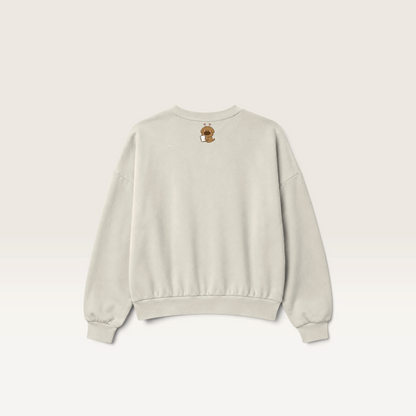 iTsChoCoBu Autumn Basket beige crewneck sweatshirt featuring a small puppy graphic on the back