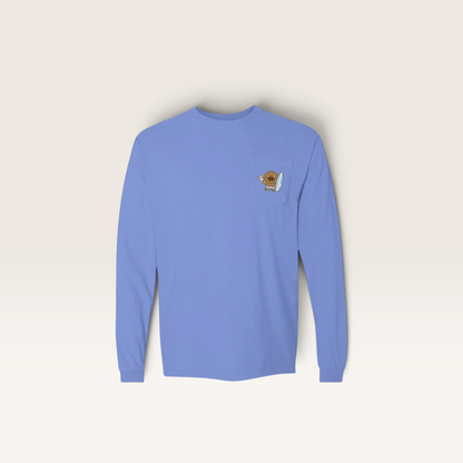 iTsChoCoBu long sleeve pocket t-shirt in periwinkle blue cotton with a small graphic on the chest pocket.