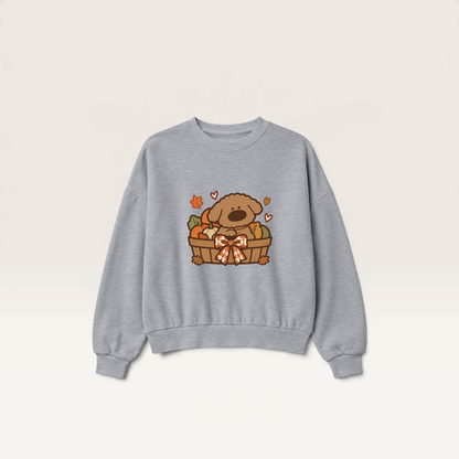 iTsChoCoBu grey crewneck sweatshirt featuring a cute puppy in an autumn basket graphic with pumpkins and fall leaves.