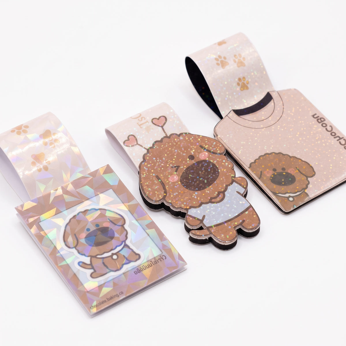 iTsChoCoBu set of three holographic magnetic bookmarks featuring cute brown puppy illustrations and t-shirt designs.