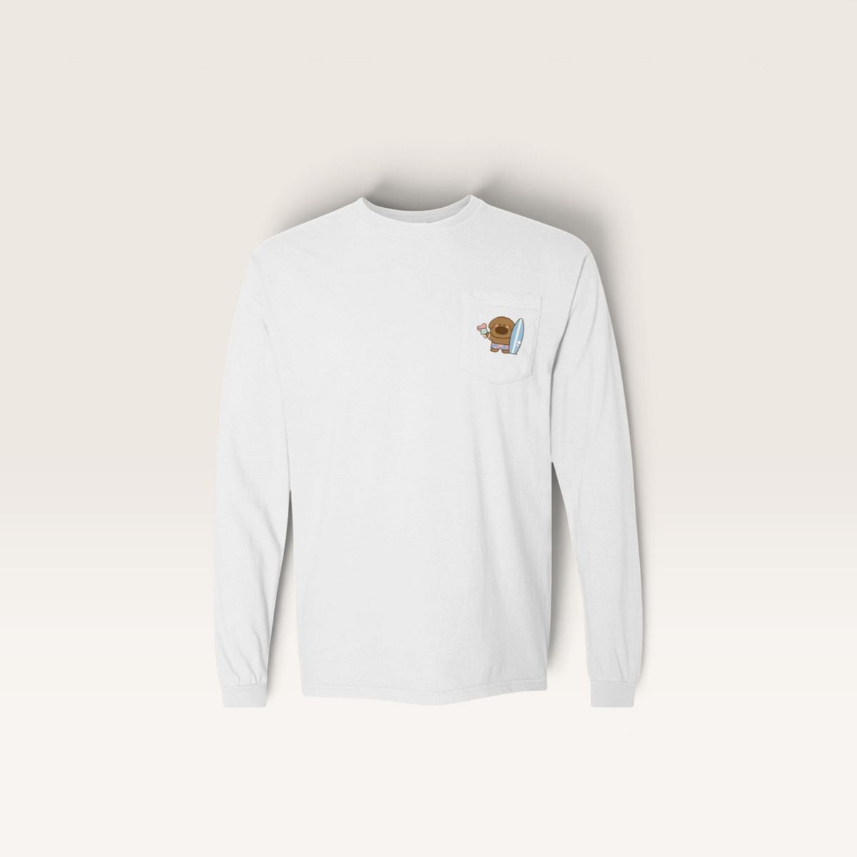 iTsChoCoBu white long-sleeve pocket t-shirt in soft-washed cotton with a small surfing bear graphic on the chest